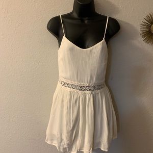 White rhomper with peek-a-boo